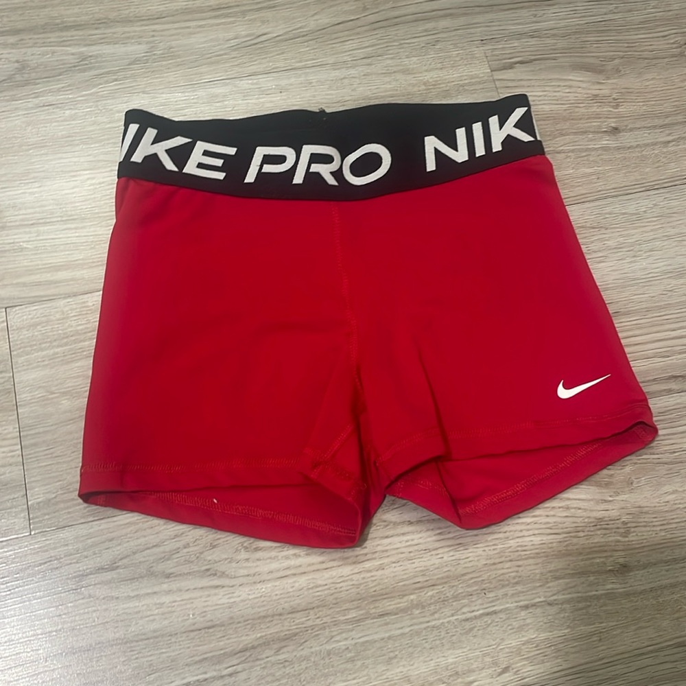 Red Nike pros size small